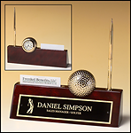 BC525 Rosewood piano finish nameplate with pen, business card holder, and goldtone metal golf ball / clock.